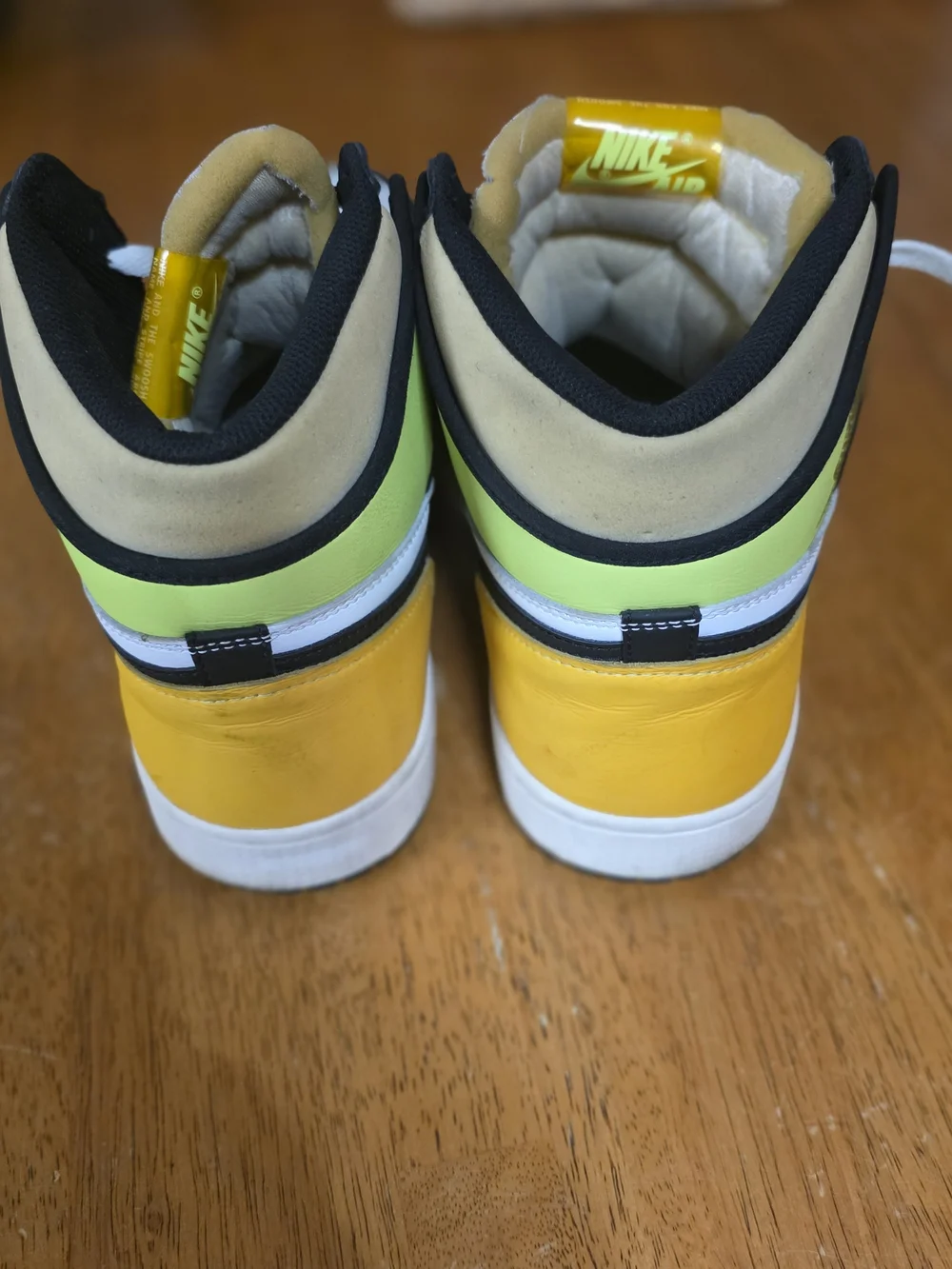 Jordan Men’s High-Top Sneakers in Black, White & Yellow Tongue